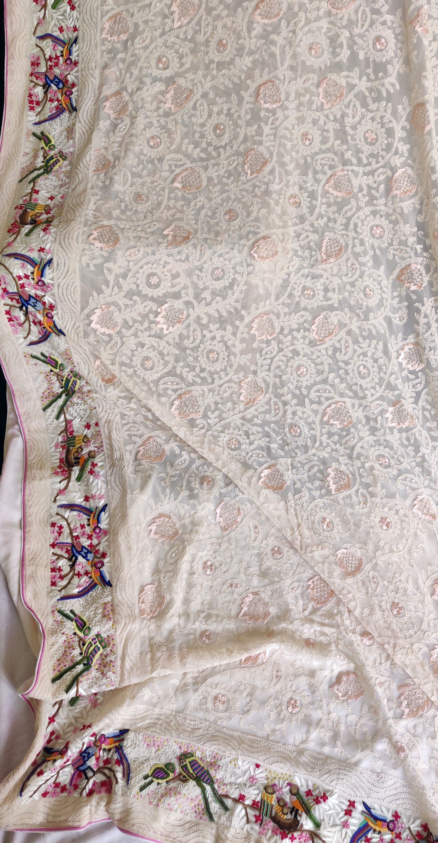 Nude Pink Pure Georgette saree with allover shadow work and masterpiece french knot hand embroidery