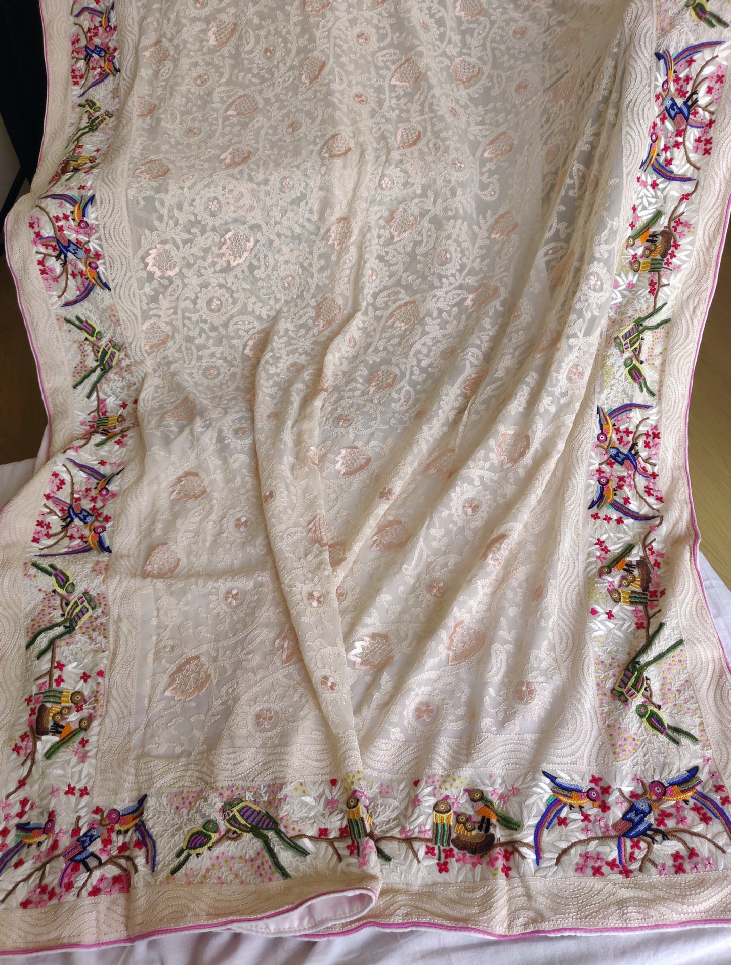 Nude Pink Pure Georgette saree with allover shadow work and masterpiece french knot hand embroidery