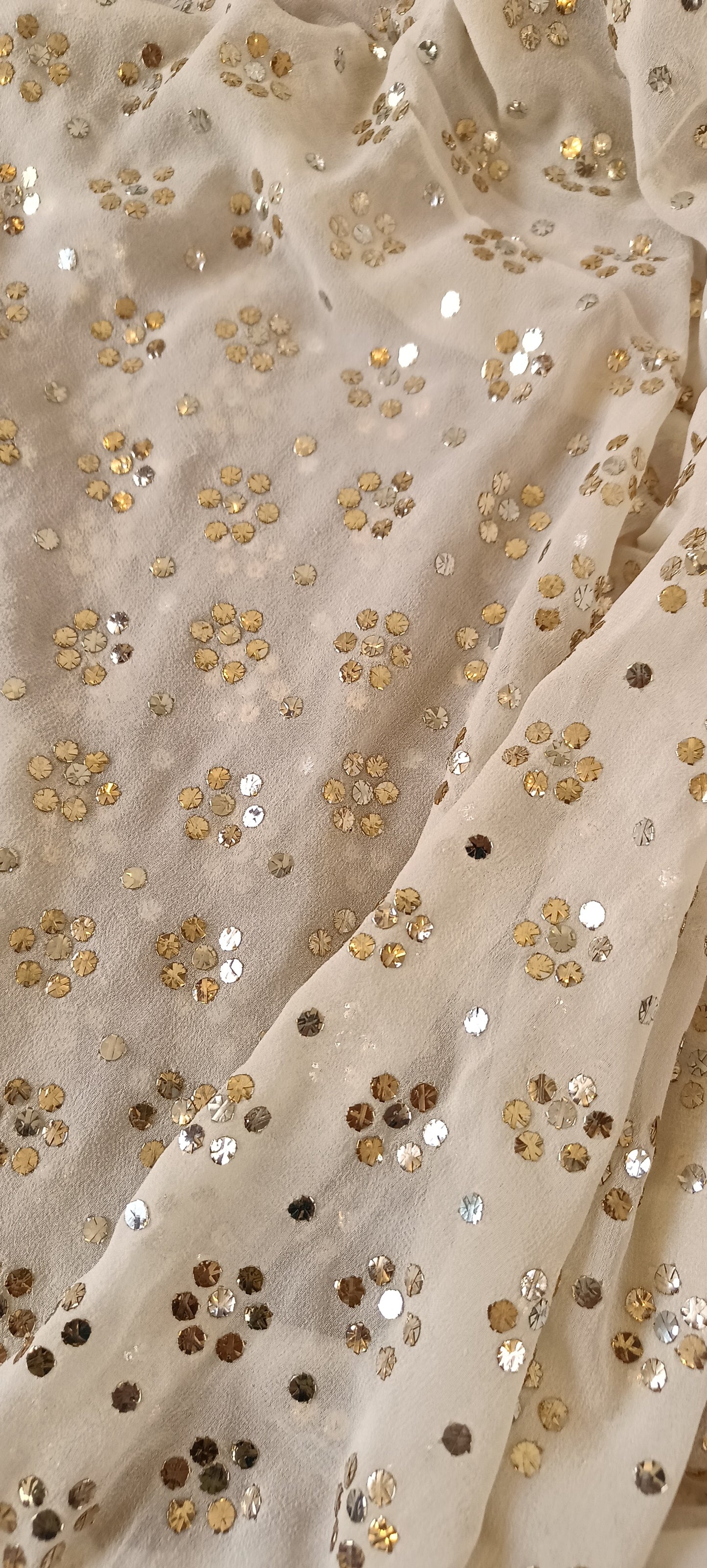 Ruhani Ivory pure georgette allover heavy mukaish running material