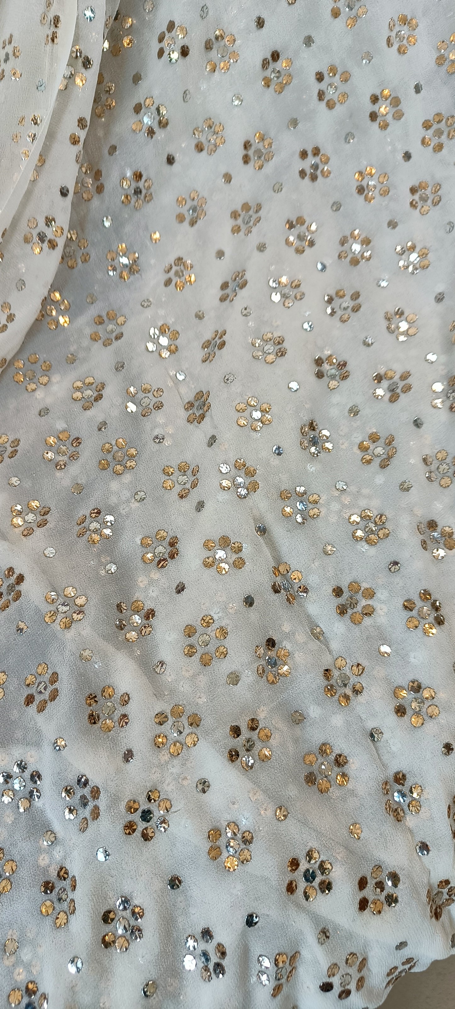 Ruhani Ivory pure georgette allover heavy mukaish running material