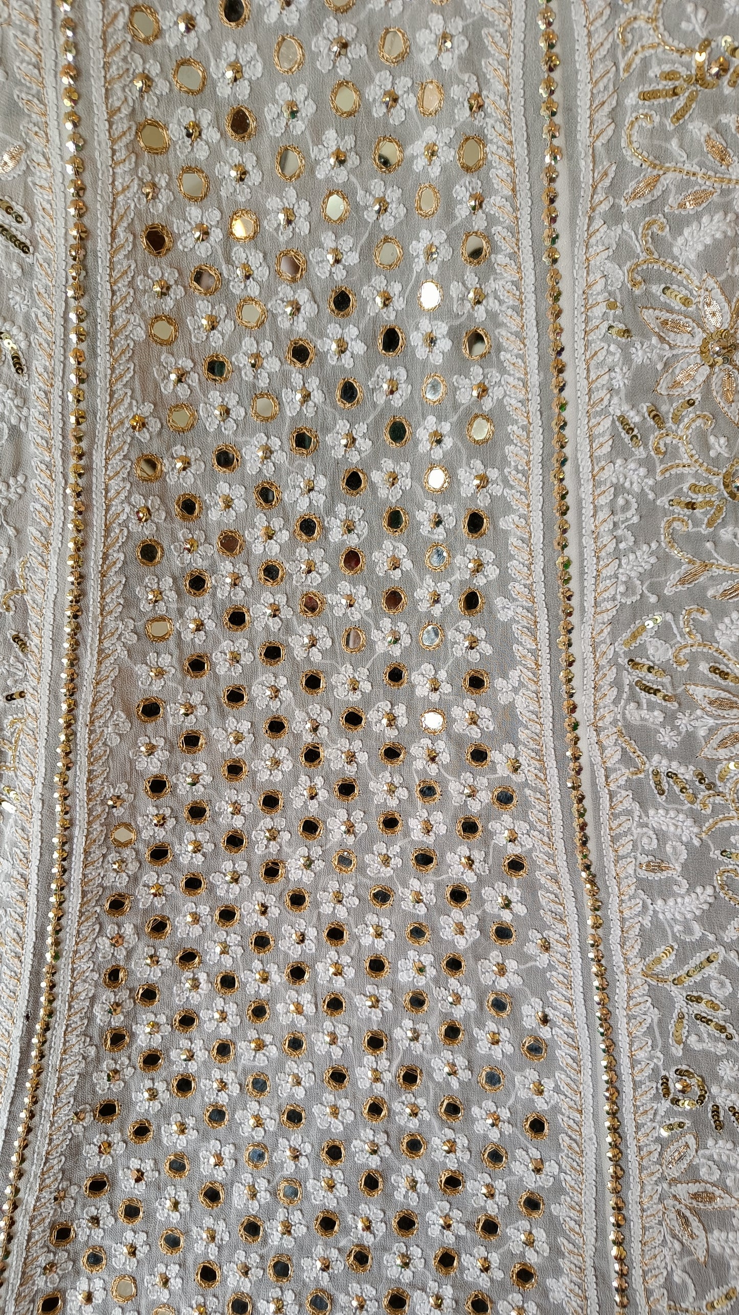 White designer lehenga skirt with allover Chikankari and heavy embellishments Lehenga skirt