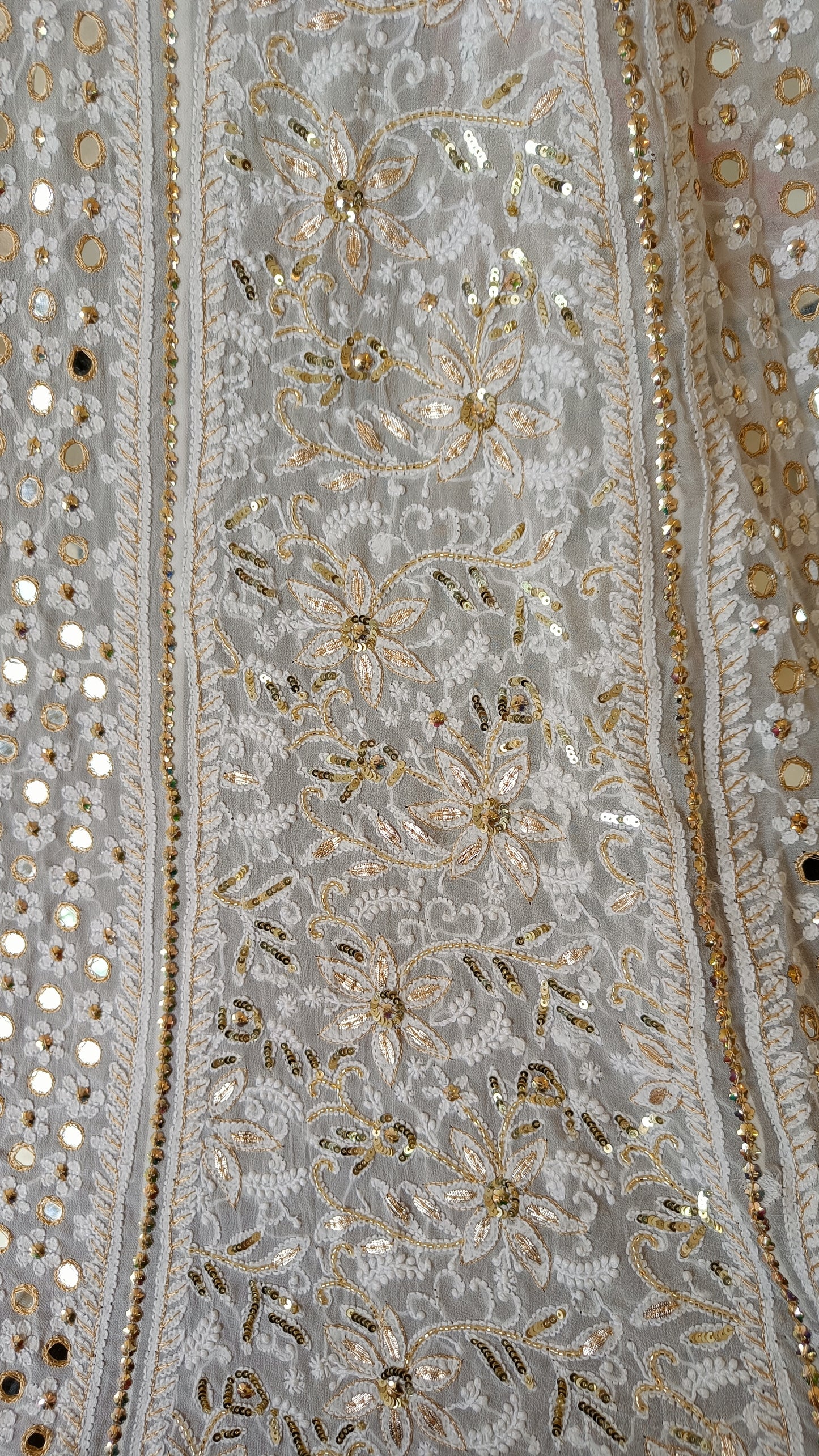 White designer lehenga skirt with allover Chikankari and heavy embellishments Lehenga skirt