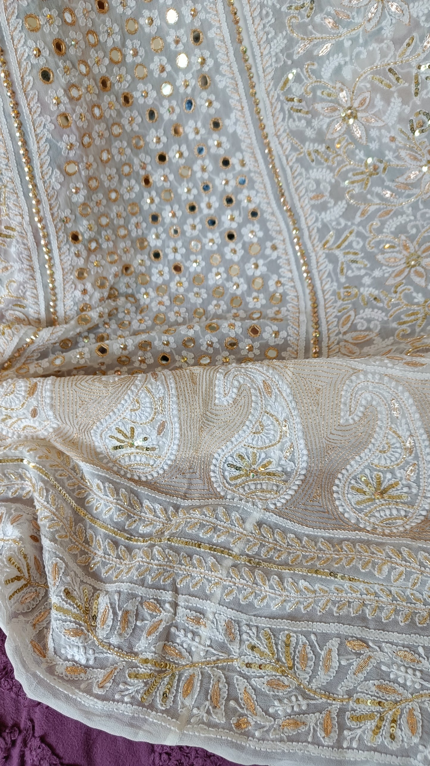 White designer lehenga skirt with allover Chikankari and heavy embellishments Lehenga skirt