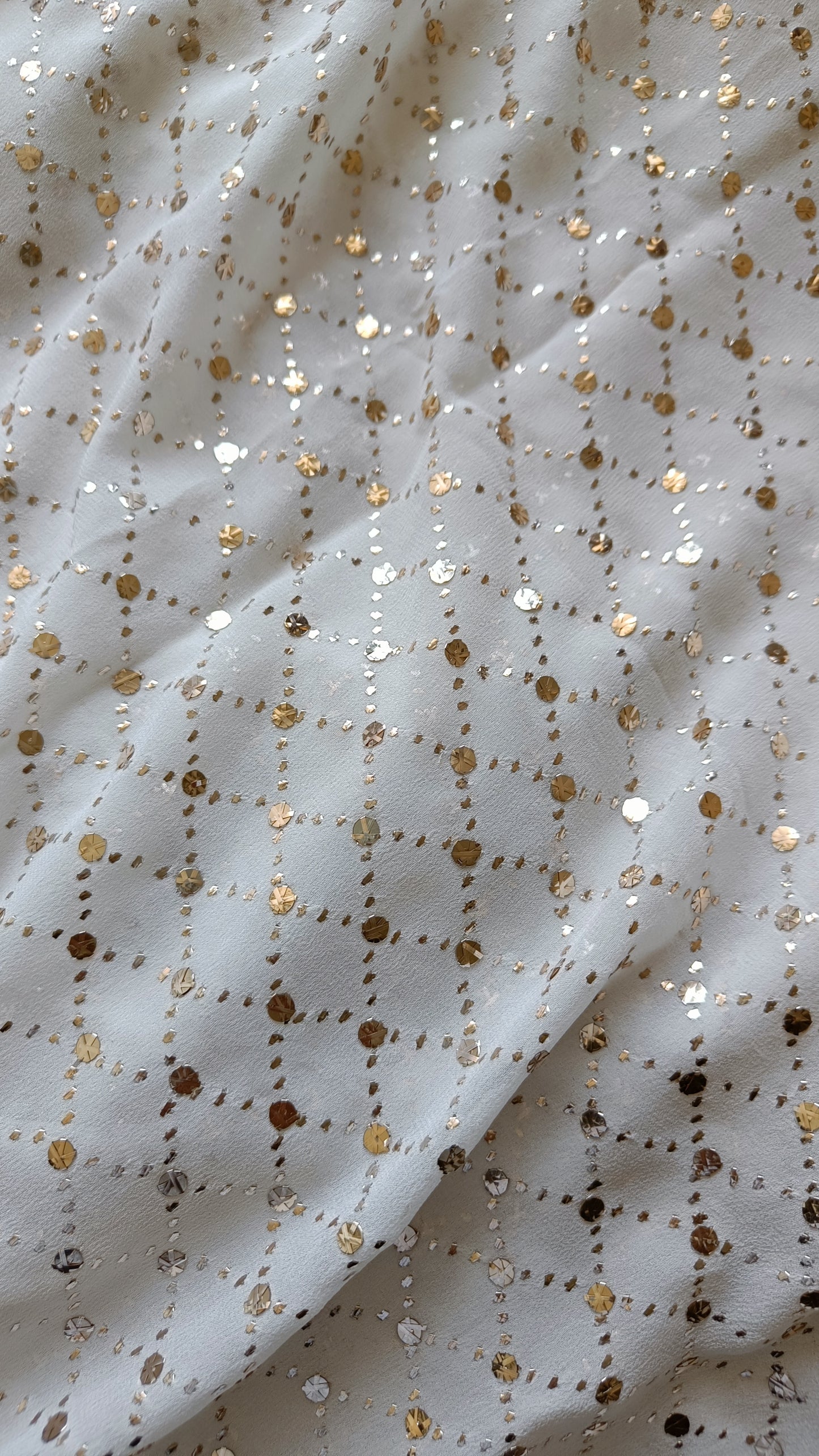 Ruhani Ivory pure georgette allover heavy mukaish running material