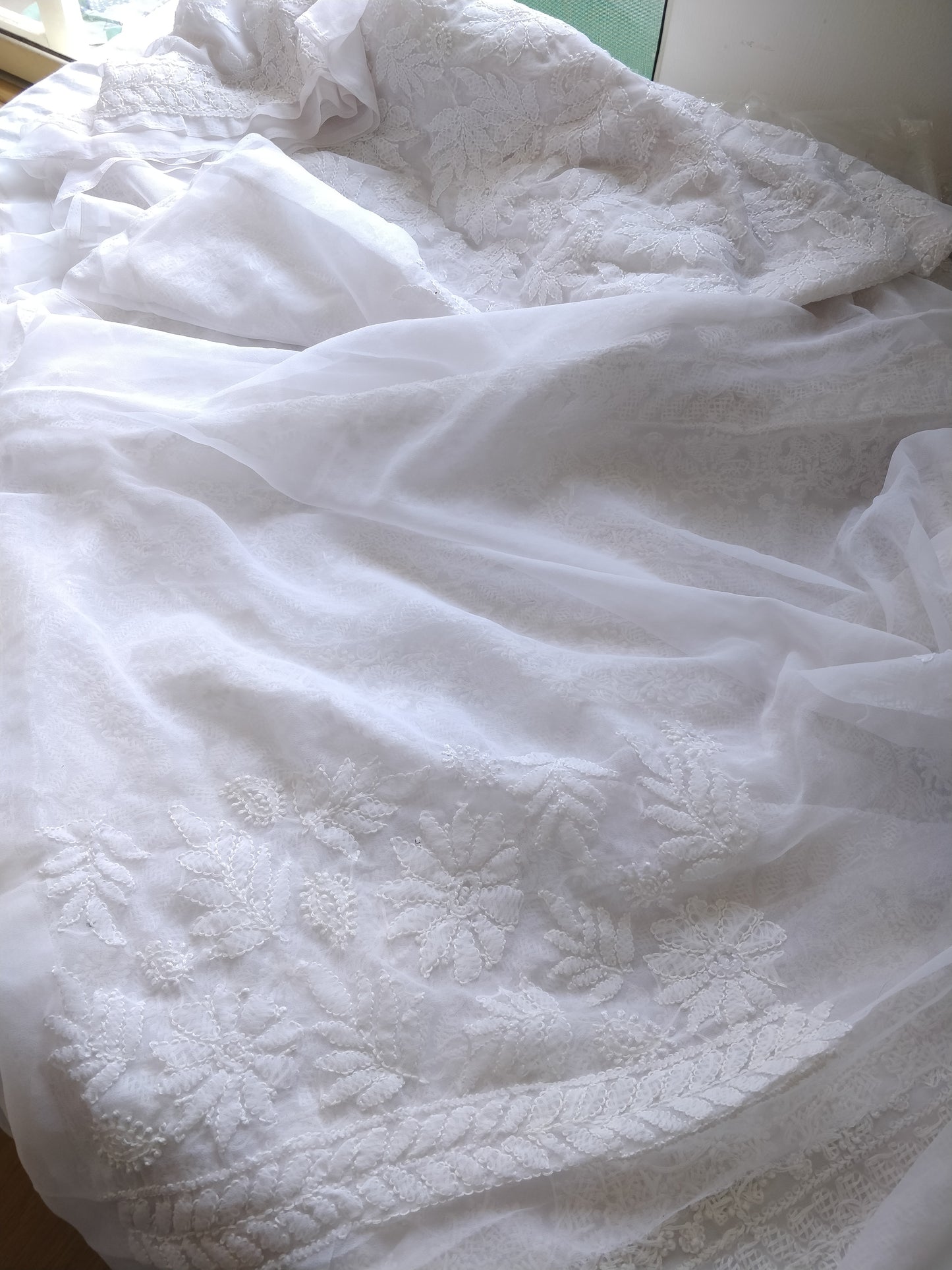 White semi georgette allover fine Chikankari saree