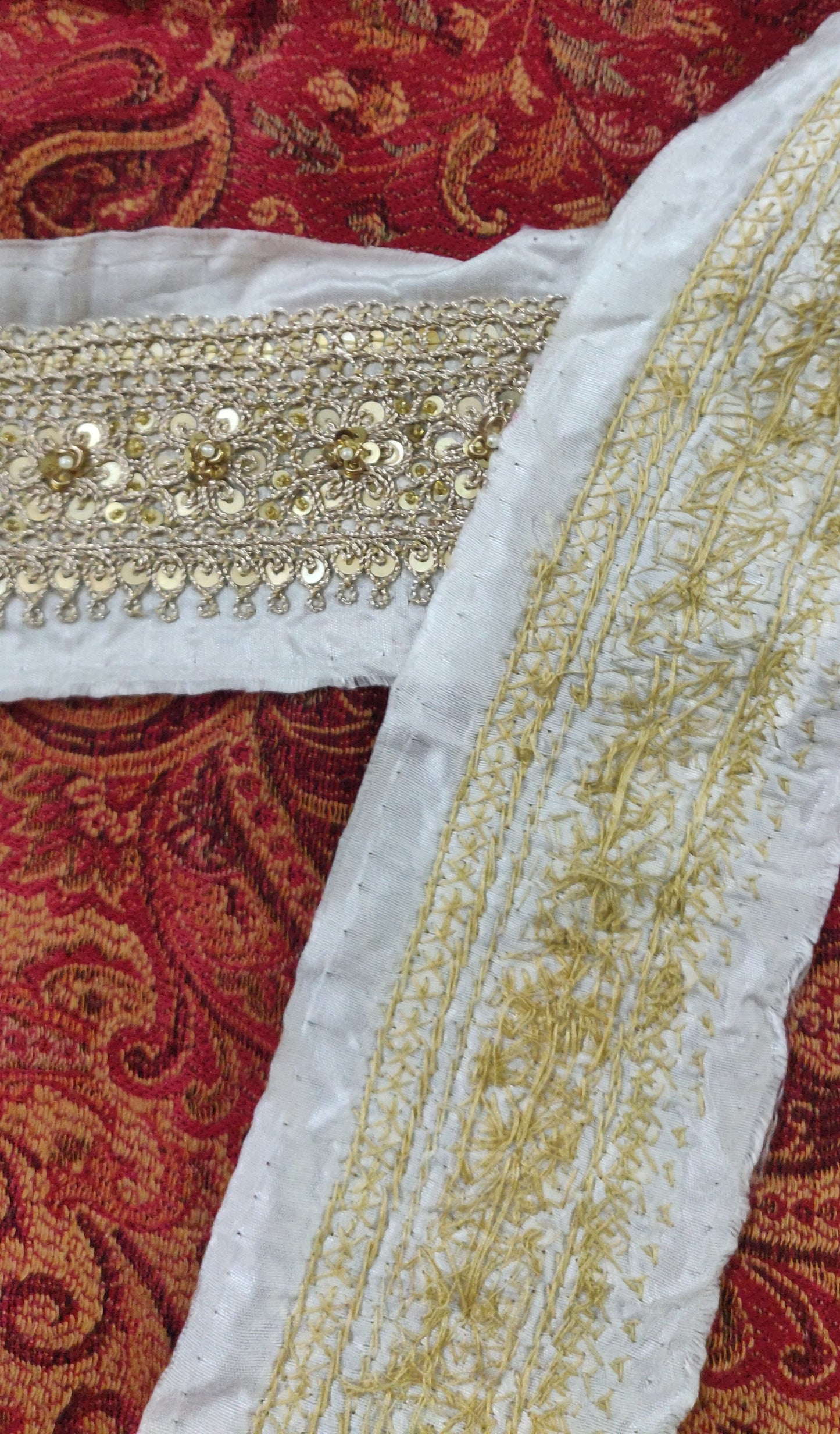 Golden hand embroidered marori border