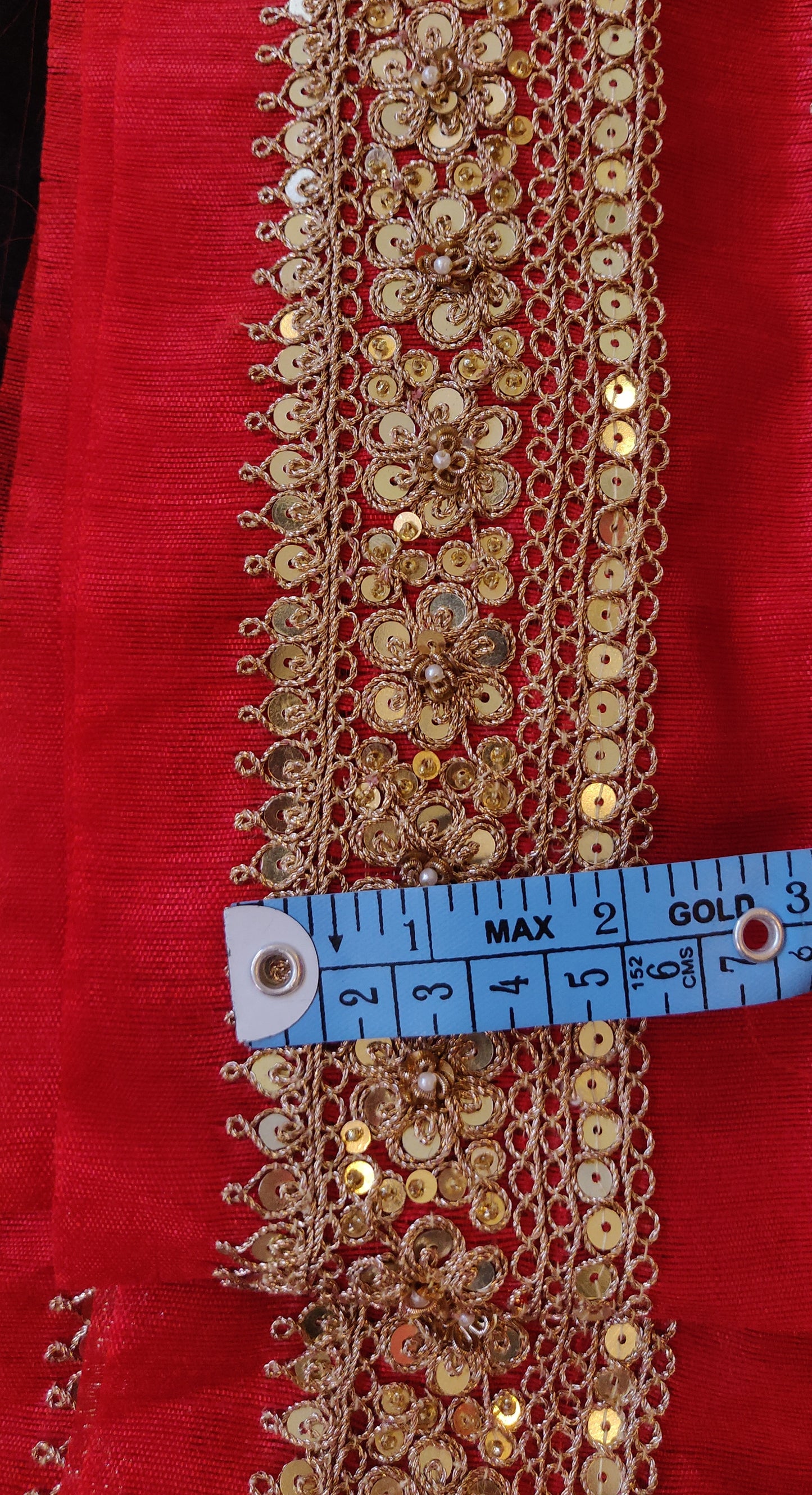 Red hand embroidered marori border