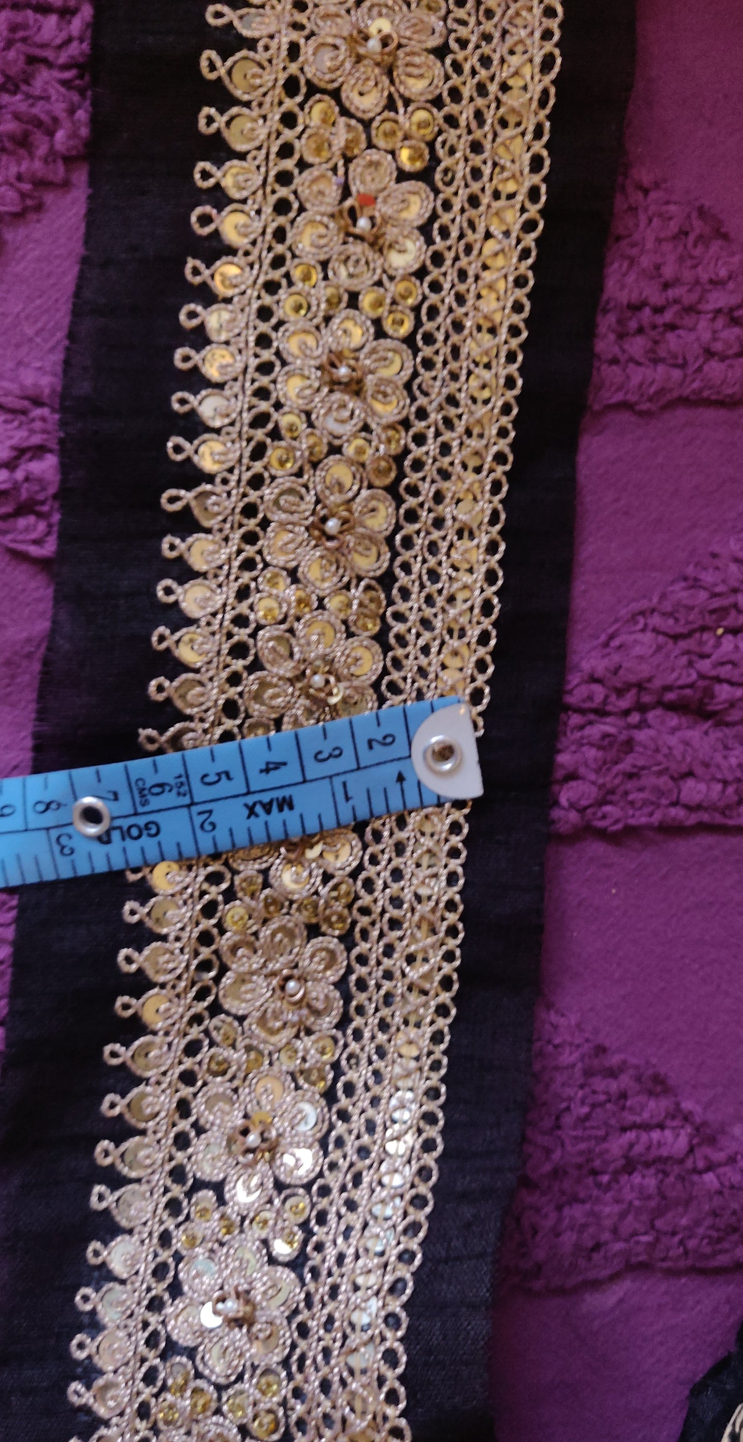 Black hand embroidered marori border