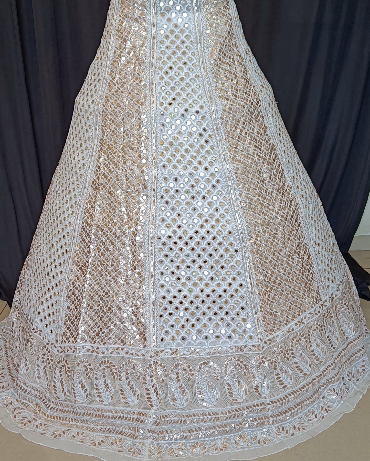 Ivory lehenga skirt with allover Chikankari and heavy mirror and gota patti