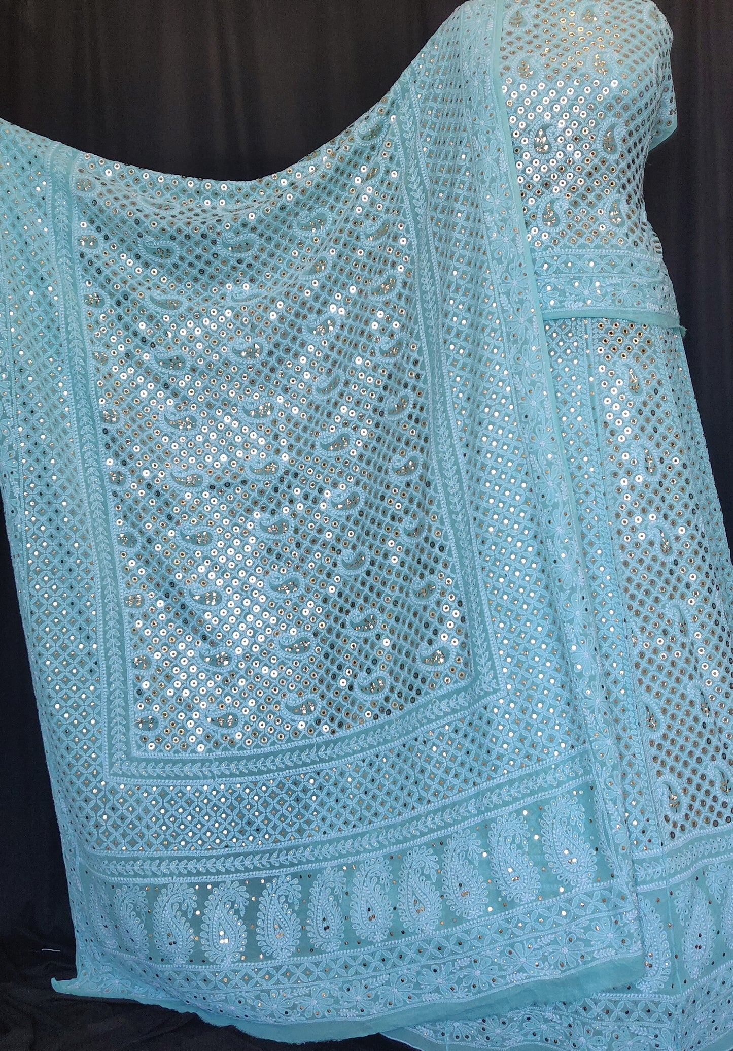 Ruhani Aqua blue Chikankari and ring mukaish lehenga set