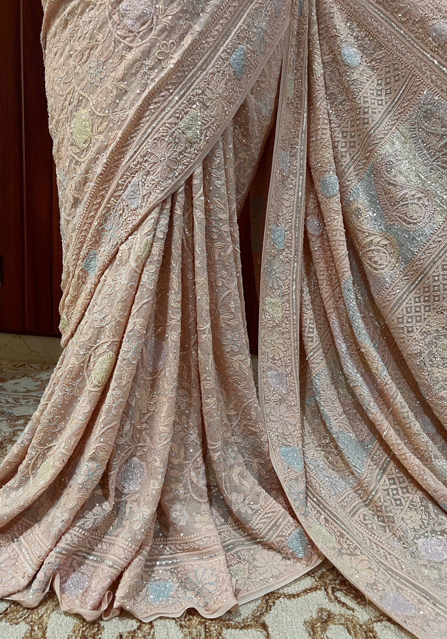 Ruhani Dusty peach Chikankari Multi Cut Dana and Sequins Saree
