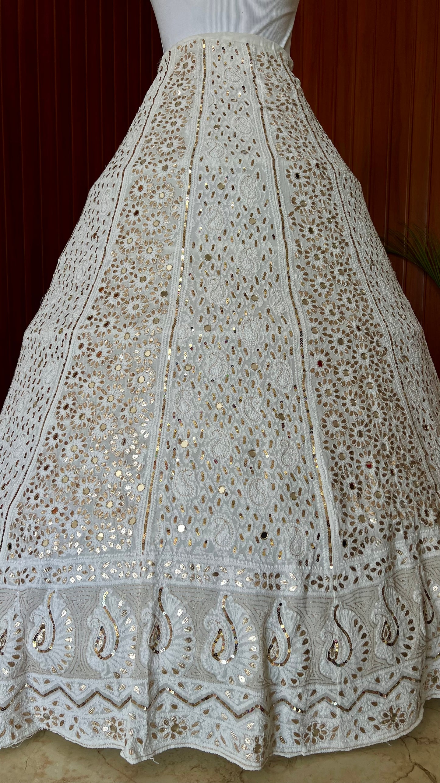 White lehenga skirt with allover Chikankari sequins and gota patti