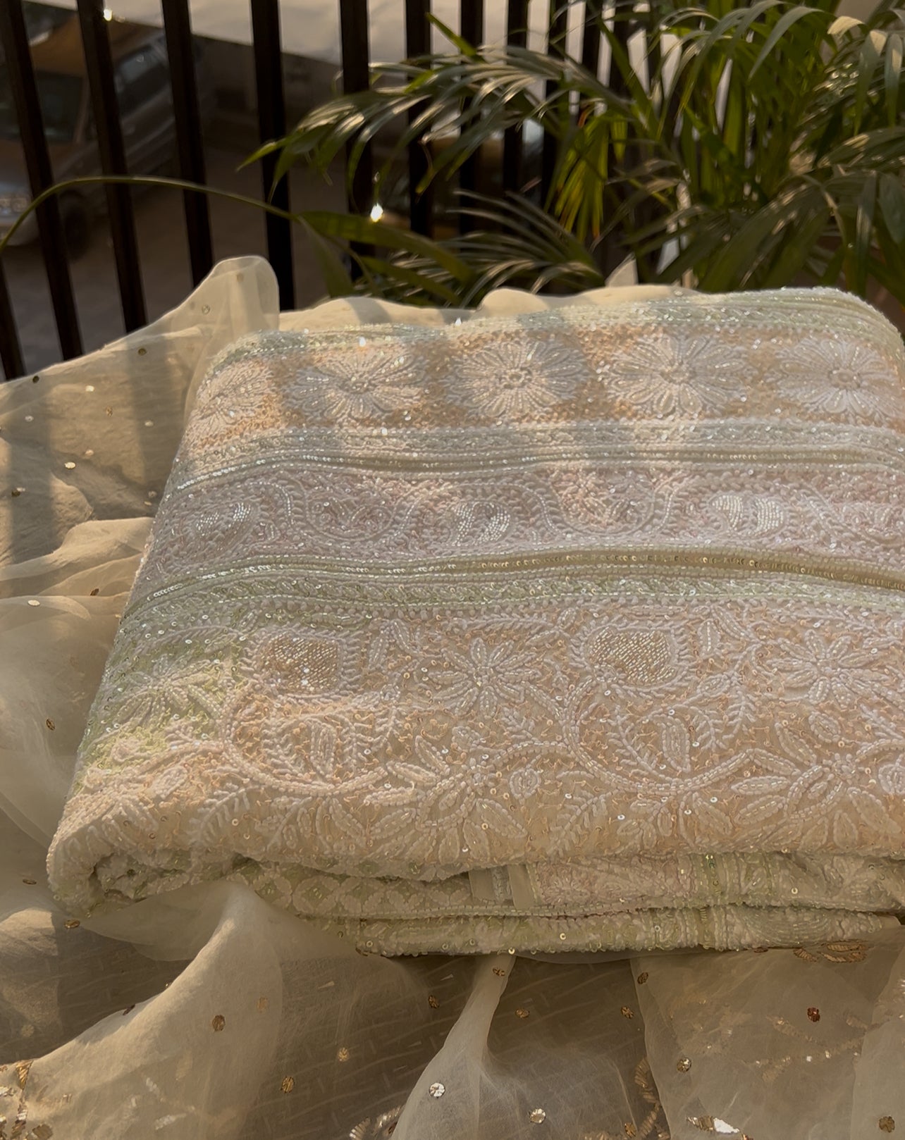 Ruhani Ivory Chikankari Multi Cut Dana and Sequins Saree