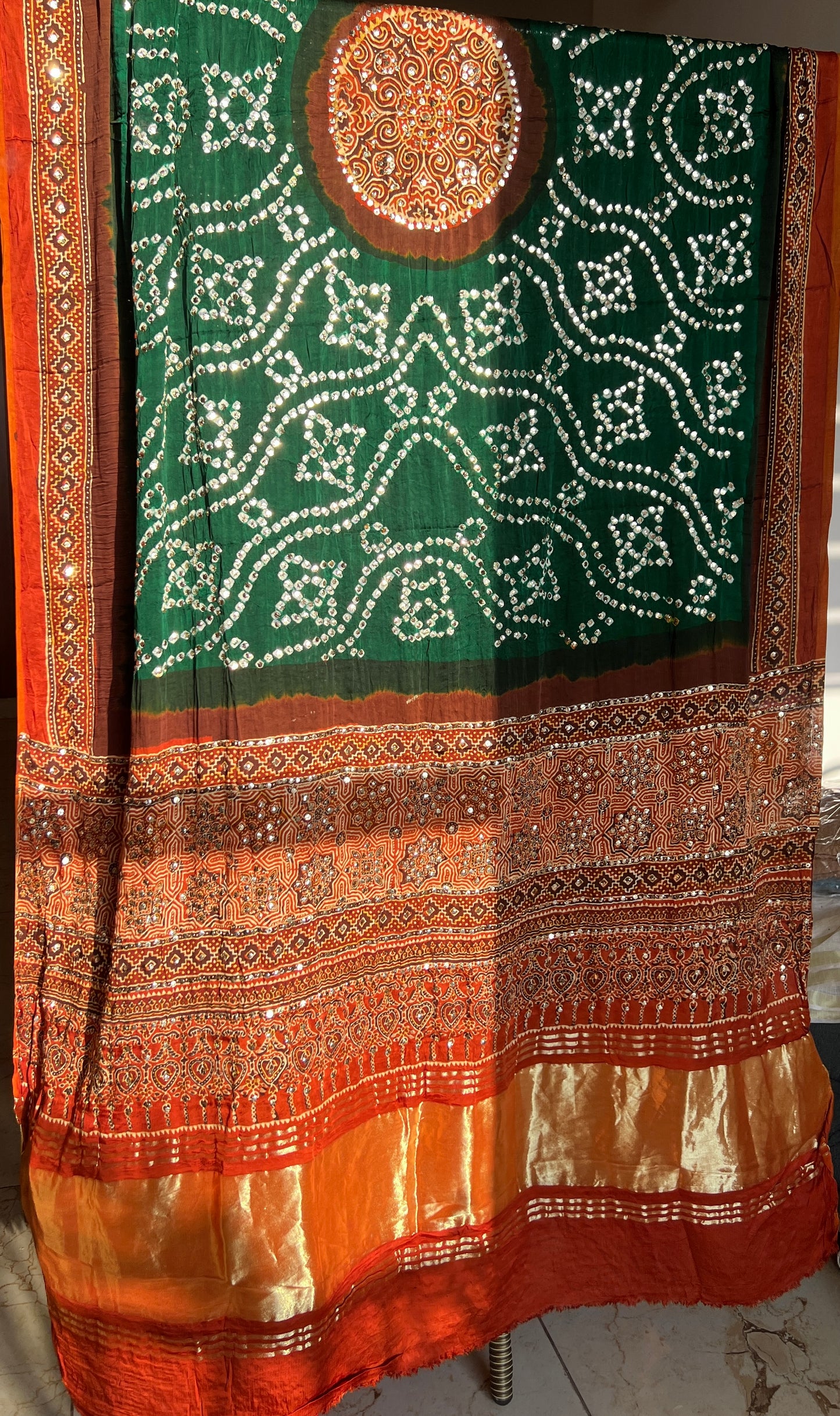 Rust and Green modal silk ajrakh and bandhej dupatta with heavy mukaish