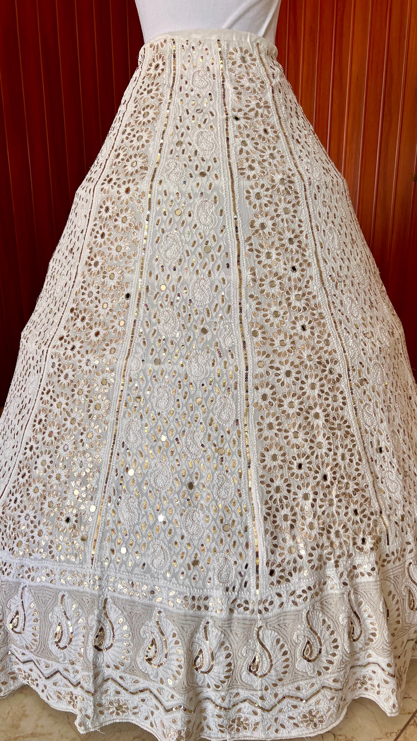 White lehenga skirt with allover Chikankari sequins and gota patti