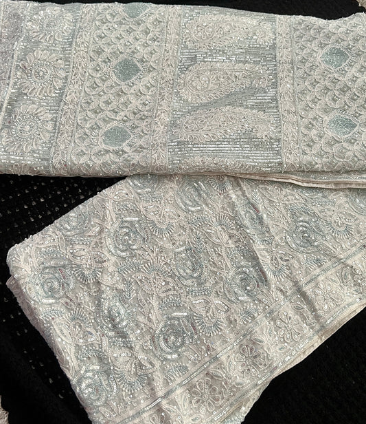 Ruhani light firozi embellished Chikankari hand Embroidered Saree