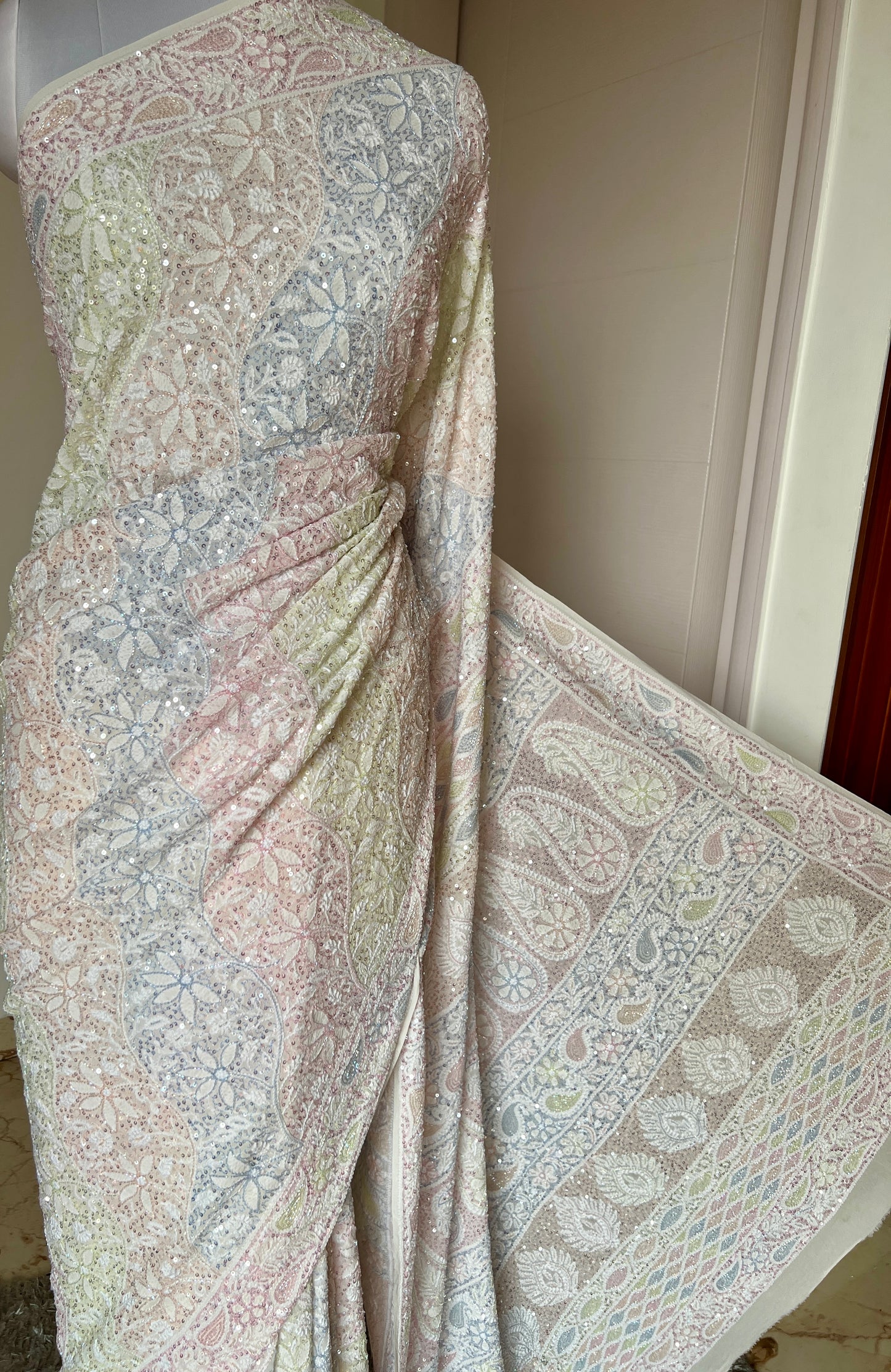 Ruhani Ivory Chikankari Multi Cut Dana and Sequins Saree
