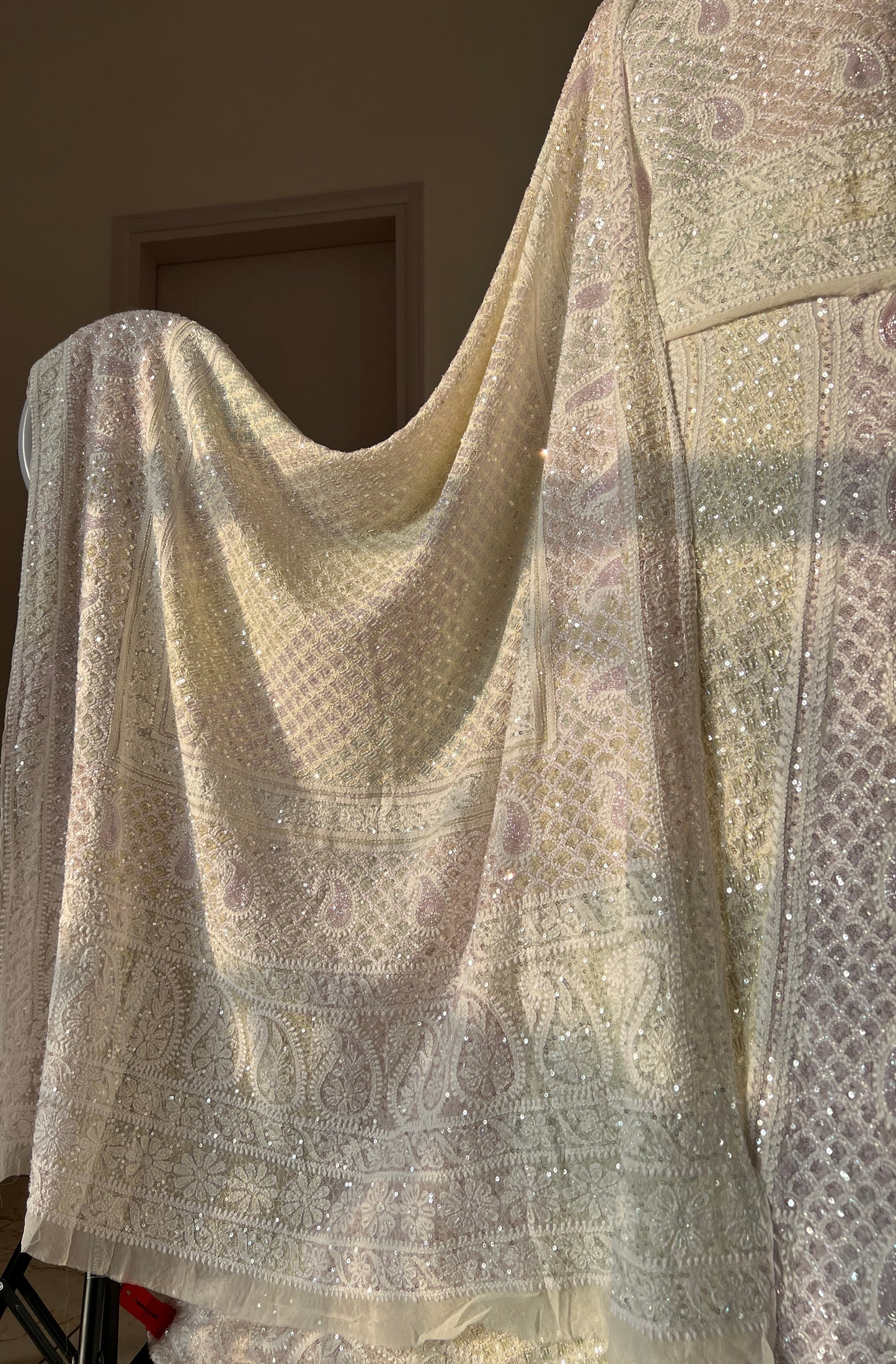 Ruhani Ivory Chikankari Lehenga with Multi Cut Dana and sequins Work