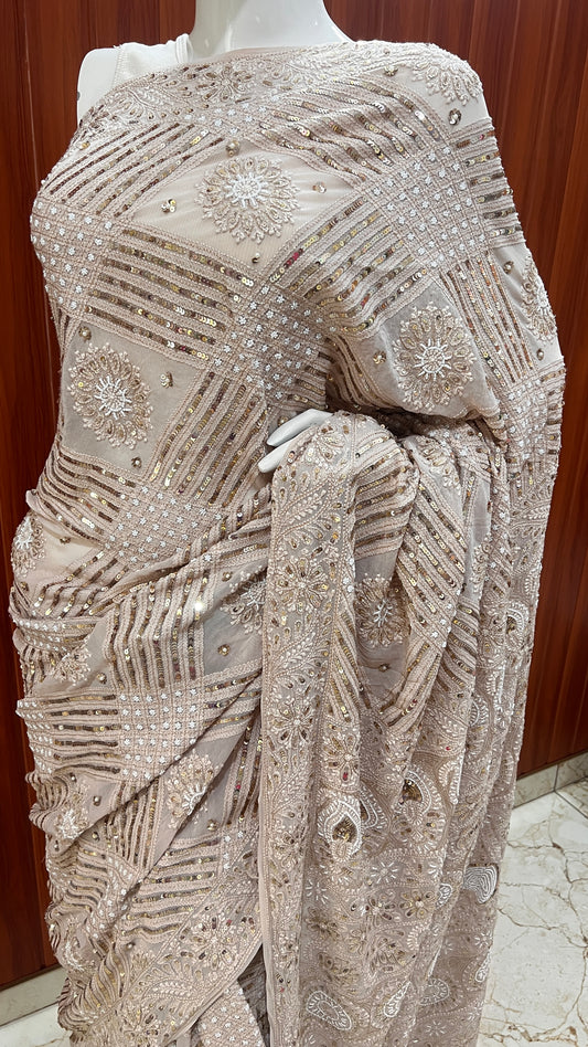 Ruhani Powder brown Chikankari Saree with Sequins Pearl and Aari Embroidery