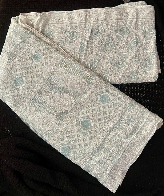 Ruhani light firozi embellished Chikankari hand Embroidered Saree