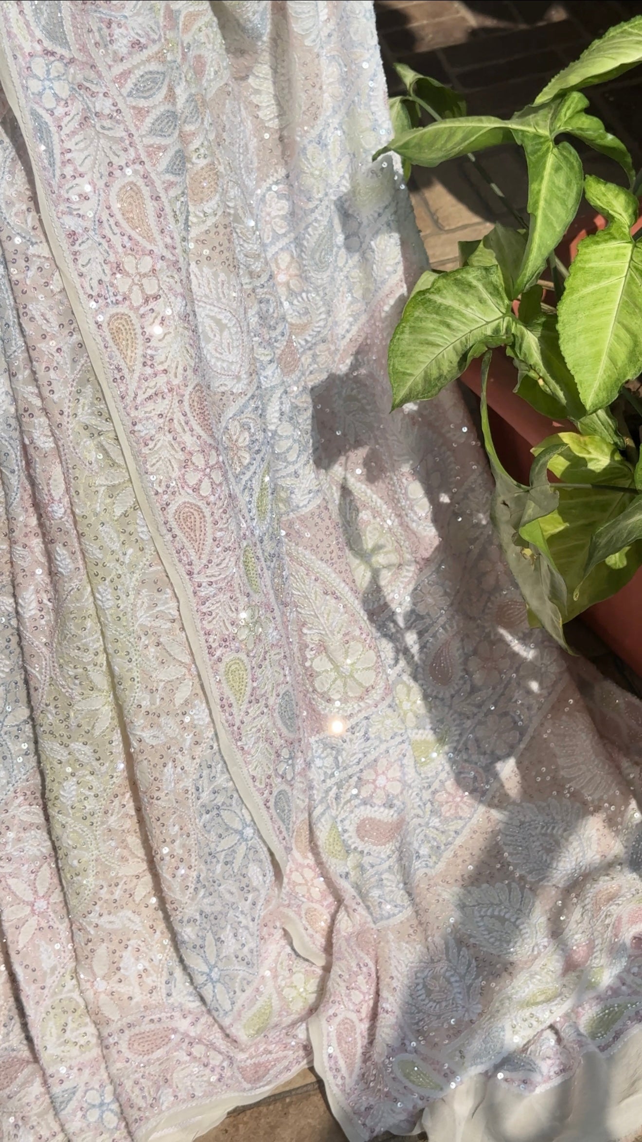 Ruhani Ivory Chikankari Multi Cut Dana and Sequins Saree