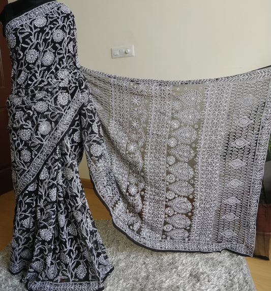 Black and White semi georgette allover fine Chikankari saree.