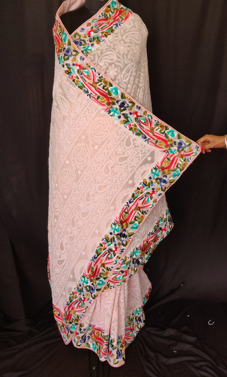 Ruhani peach Chikankari and parsi gara border saree