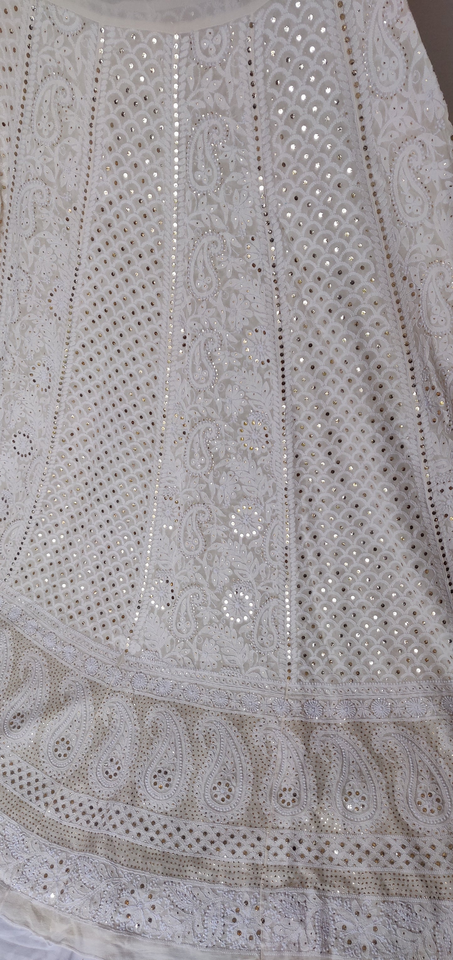 Ruhani Ivory allover Chikankari and heavy mukaish lehenga set