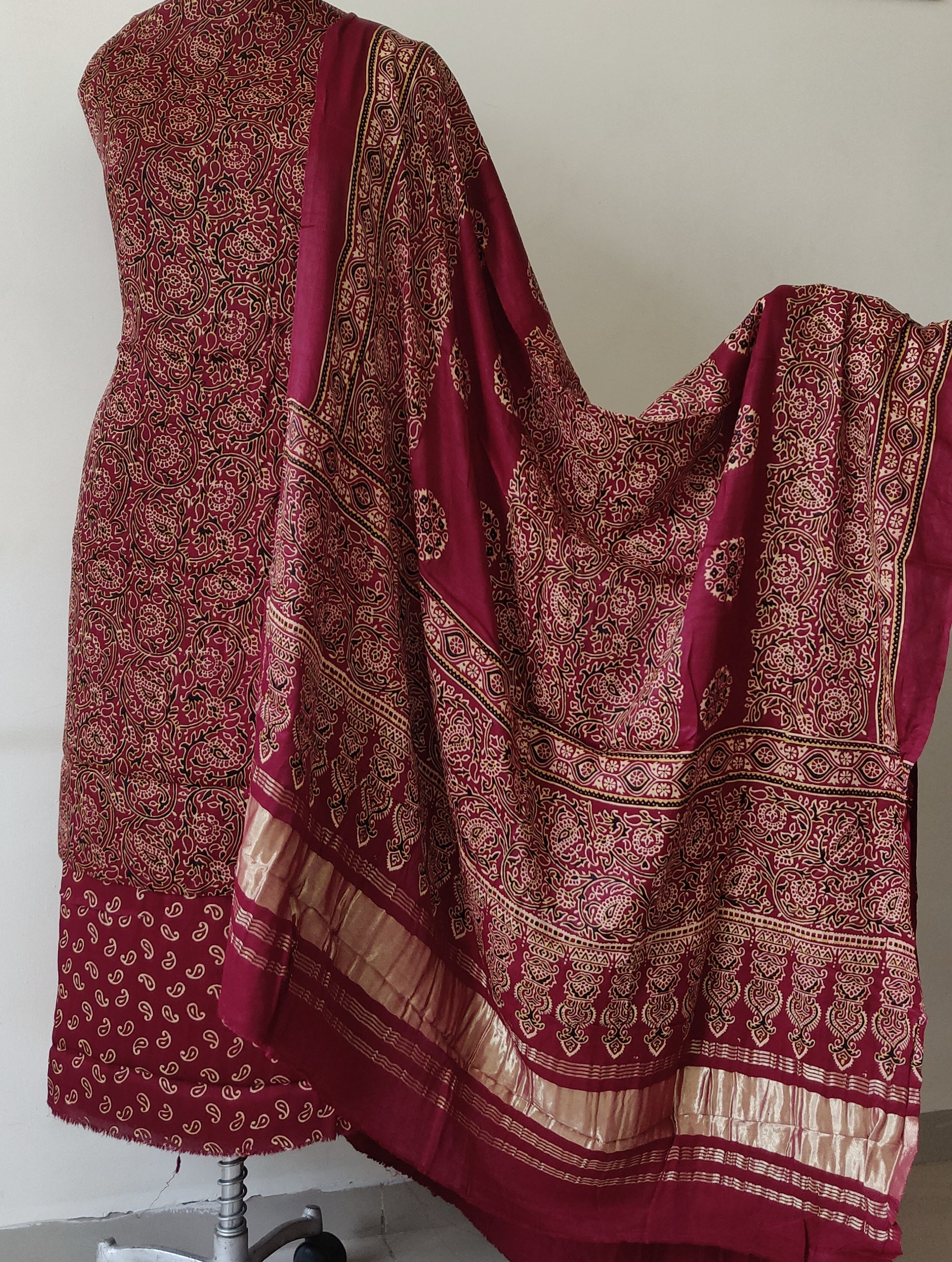 Multi-color material chudidar set, geometric and ajrakh printed with mirror work crepe top, plain maroon bottom, and intricately printed and miror work chinon dupatta main image 0