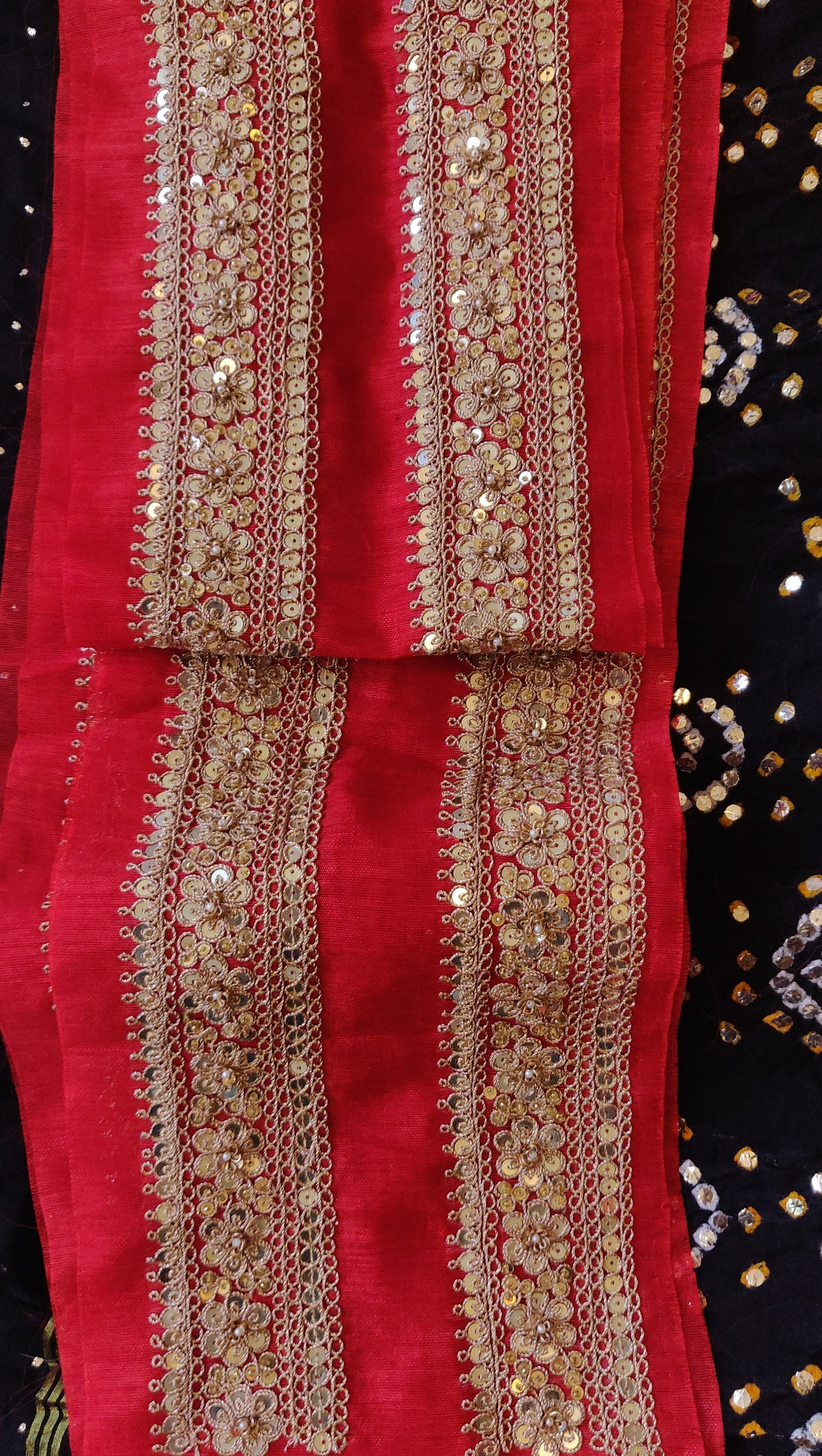 Red hand embroidered marori border