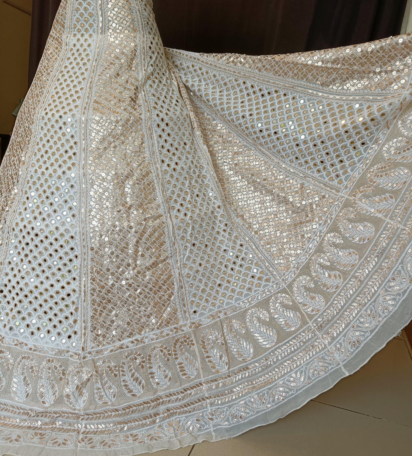 Ivory lehenga skirt with allover Chikankari and heavy mirror and gota patti
