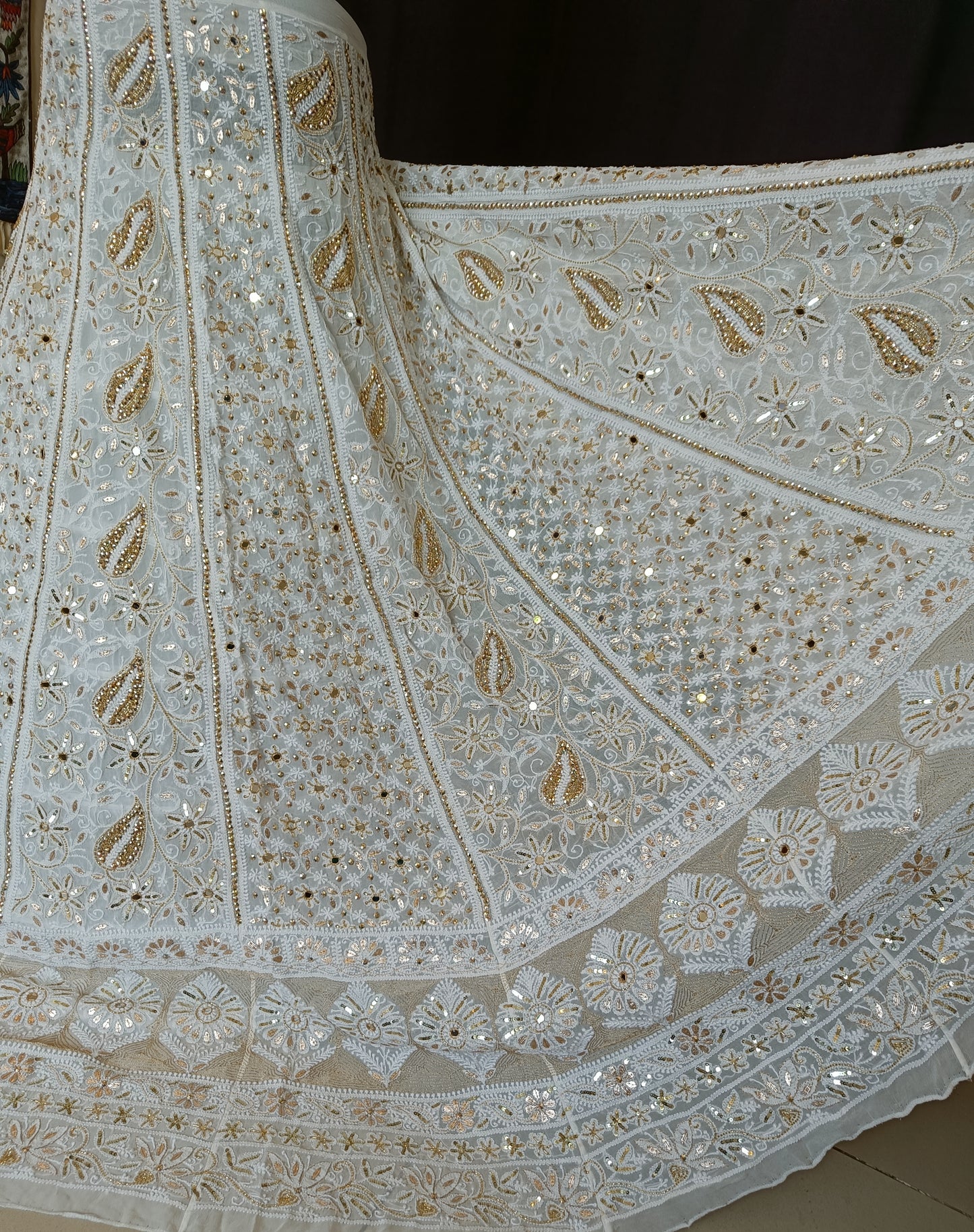 Ivory designer lehenga skirt with allover Chikankari and heavy embellishments Lehenga skirt