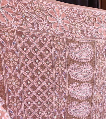 Ruhani Peach masterpiece Chikankari and heavy pearl embroidered saree