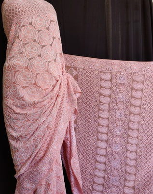 Ruhani Peach masterpiece Chikankari and heavy pearl embroidered saree